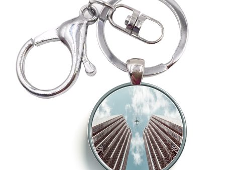 Airplane Flying over Big Buildings Designed Circle Key Chains For Discount